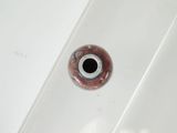 an image of a sink with a drain in the middle of it