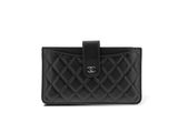 portefeuille Chanel en cuir matelassé noir
