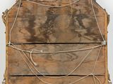 an old wooden mirror with a rope wrapped around it