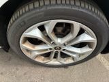 a close up of a tire on a car ' s rim