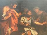 painting of a group of people sitting around a fire in a room