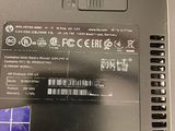 a close up of a laptop with a sticker on it