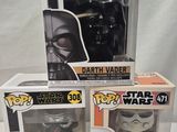 three star wars pop vinyl figures sit on a white surface