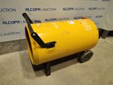 un grand fût jaune posé sur un chariot métallique
