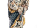 an image of a statue of a woman holding a child