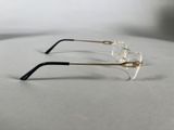 pair of glasses on a table with a white background