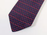 an image of a red and blue tie on a white surface