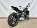 a picture of a motorcycle parked in a garage