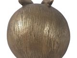 a gold vase with two birds on top of it