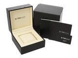 a close up of a box with a watch inside of it