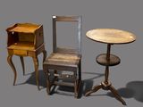 three chairs and a table with a chair on it