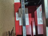 a pair of scissors that are sitting on a box