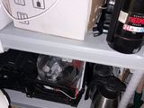 a shelf that has a bunch of items on it