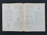 an open book with a picture of a clock on it