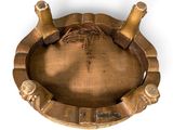 an image of a brass ashtray on a white background