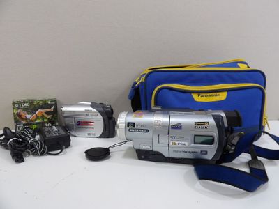 a camera and a bag sitting on a table