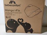 la boîte est posée sur une surface blanche et comporte une illustration représentant deux éléphants