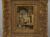 an oil painting of a church with a gold frame
