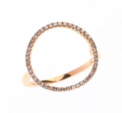 BAGUE en or rose 750 °/°° à décor d'un cercle pavé de diaman…