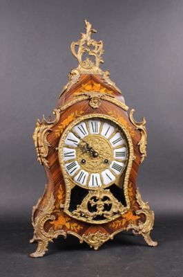 a clock that is sitting on top of a table