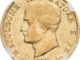 gros plan d'une pièce d'or sur fond blanc