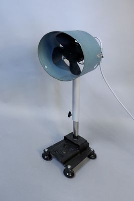 an image of a table lamp with a fan on top of it