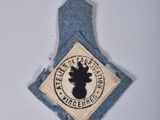 a small patch with a picture of a deer on it