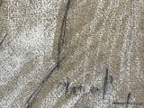 drawing of a man in a suit with a tie on a piece of cloth