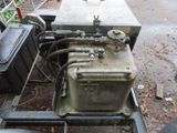 a small engine that is sitting on a cart