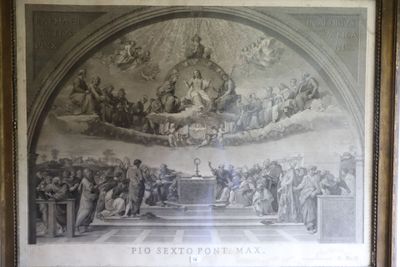une photo encadrée représentant une peinture illustrant une scène religieuse