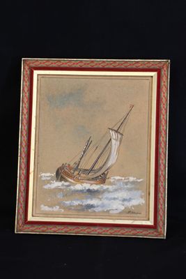tableau représentant un voilier en mer, dans un cadre rouge