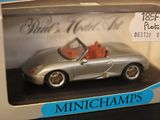 a toy car in a box with a price tag on it
