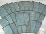 a lot of old papers that are in a white box