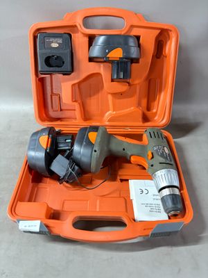 a tool in the orange case that is on the floor