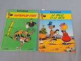 three children ' s books are sitting on a table next to each other