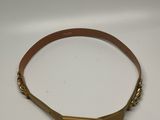 a close up of a gold belt with a buckle on it