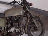 a motorcycle that is parked in a garage