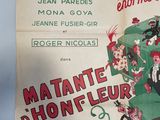 french movie poster for a musical show starring a man in a top hat and a woman in a top hat and a man in a top hat with a top hat