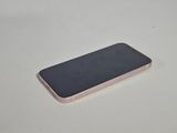 an iphone is sitting on a table with a white background