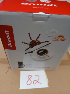 emballage d'une boîte de café sur laquelle figure l'image d'une araignée