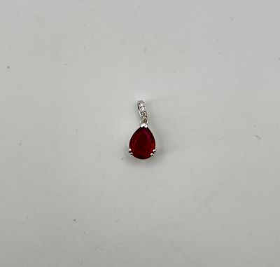Pendentif en or blanc 750°/.(18K) orné d'un Rubis TRAITE tai…