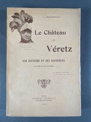 un vieux livre sur lequel figure le dessin d'un homme portant un chapeau