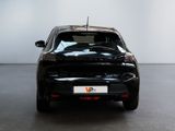 a picture of a black car parked in a showroom