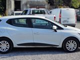 a white car that is parked in a parking lot