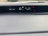 a car dashboard with a digital display on it