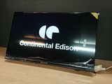 une pancarte sur laquelle est inscrit « Commercial Edison », posée sur une table