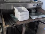 an image of a commercial kitchen with stainless steel appliances
