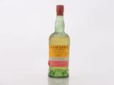 an image of a bottle of whisky sitting on top of a table