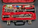 two clarinets in a case on a table