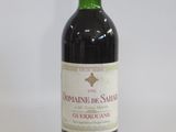 a bottle of wine that is sitting on a table